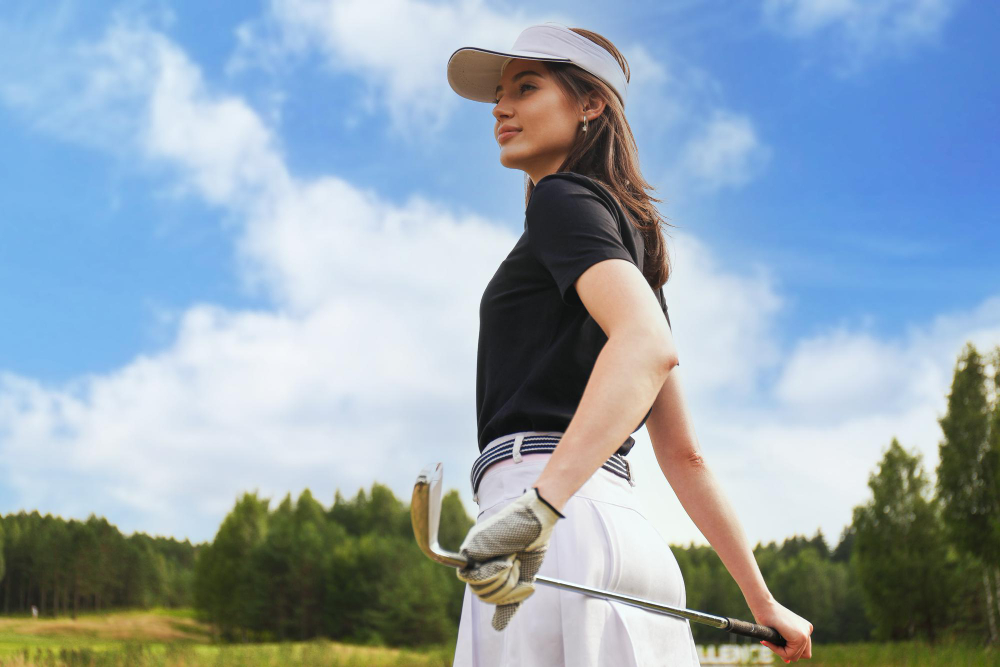 An image showcasing stylish women's golf outfits on the golf course.